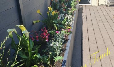 Aménagement d'une terrasse - Pose et plantation de bacs à fleurs - Pose de barrières composites à LYON